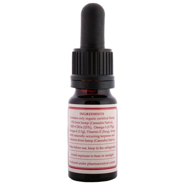 une bouteille d'huile de vitamine avec un compte-gouttes.