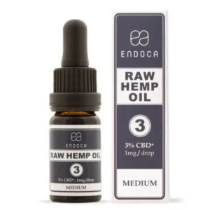 Une bouteille et une boîte d'Endoca Huile de CBD 3%, étiquetée 1mg/goutte, force moyenne. L'emballage est blanc et gris foncé avec un texte clair.