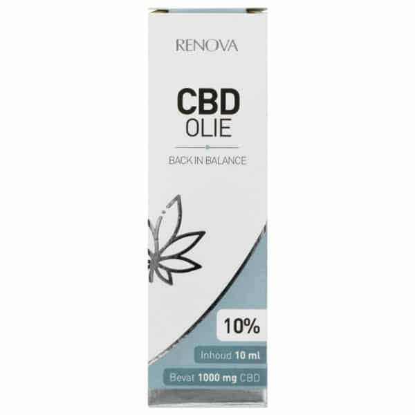 une bouteille d'huile de cbd posée sur une table.